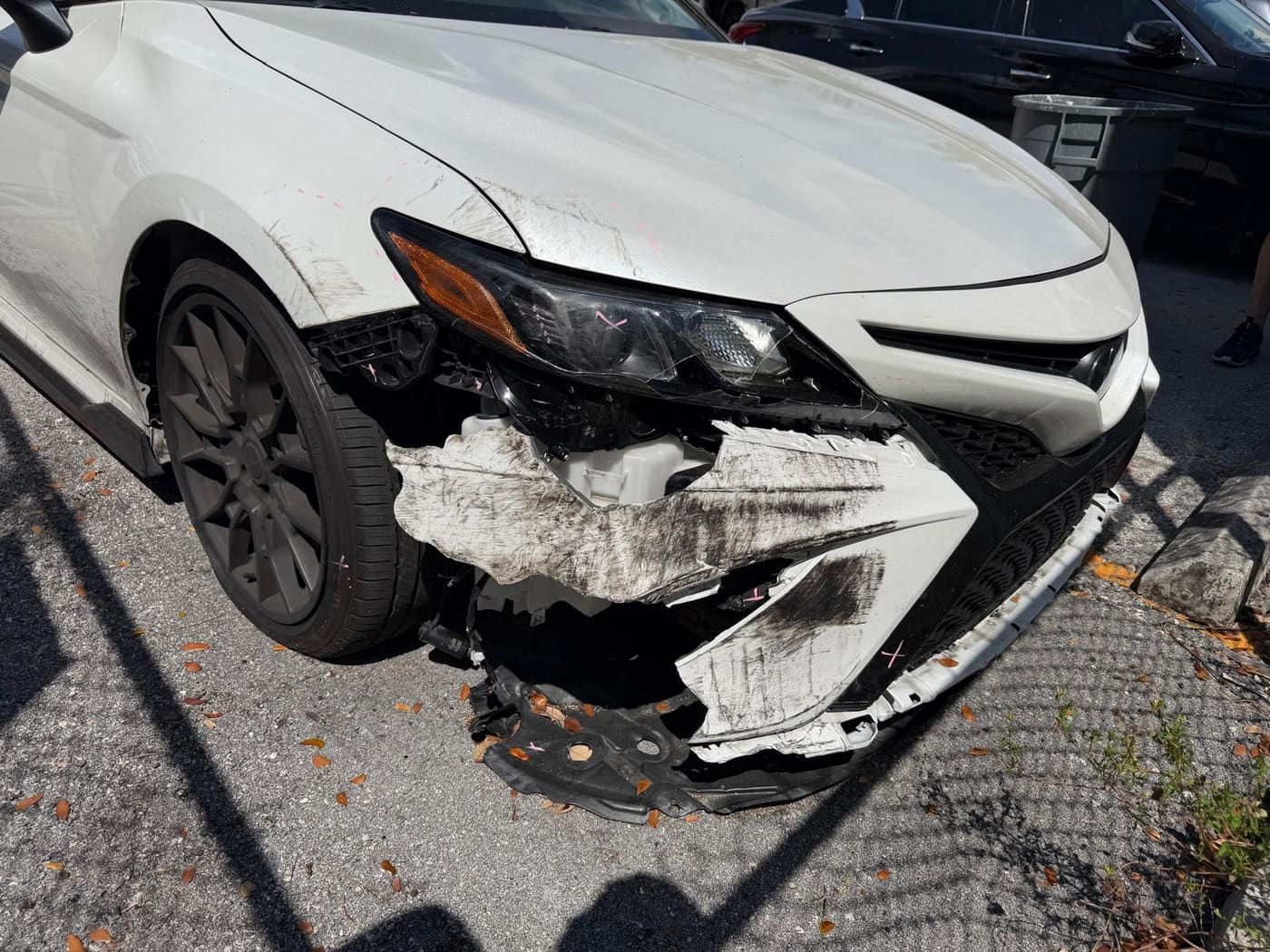 The same Toyota Camry before repair, showing collision damage