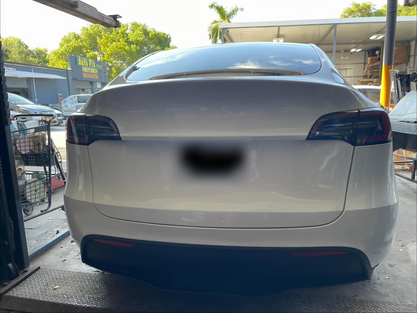 White Tesla after collision repair at Autofix Plus